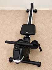 Black Hydraulic Rowing Machine, Adjustable Resistance, Foot Straps