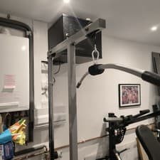 Lat Pulldown Machine & Dumbells.